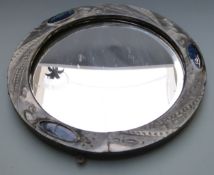 Arts and Crafts pewter mirror set with Ruskin cabochons and bevelled glass, overall diameter 49cm