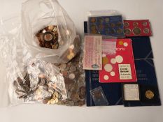 A large collection of overseas 'holiday change' etc together with a small amount of UK coinage and