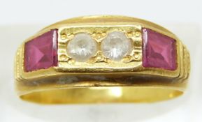 A yellow metal ring set with white sapphires and synthetic rubies, size M