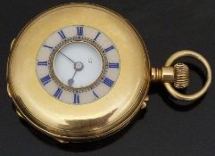 W C Mann of Gloucester 18ct gold keyless winding half hunter pocket watch with black hands and Roman