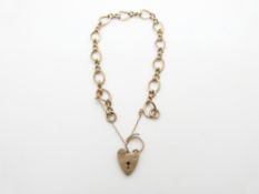 A 9ct gold bracelet with heart padlock clasp, 10g