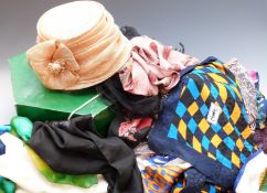 A collection of ladies designer scarves including Yves Saint Laurent example with hand rolled