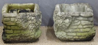 A pair of garden planters with stone wall design, height 30cm