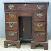 Small Georgian mahogany desk with single plank top, fitted single long drawer and three drawers to
