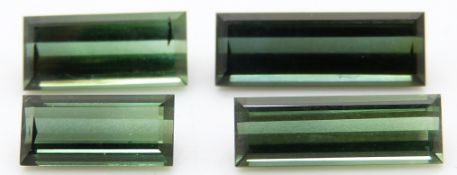 Four rectangular cut green tourmalines (Paraiba), largest 2.1ct, smallest 1.4ct