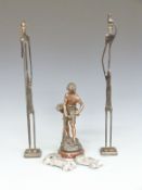 A pair of stylised bronze African figures, a late 19thC/early 20thC spelter figure of a fisher