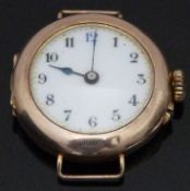 9ct gold wristwatch with blued hands, Arabic numerals, gilt minute markers, white enamel dial and
