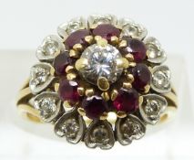 An 18ct gold ring set with a round brilliant cut diamond of approximately 0.45ct surrounded by