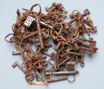 A large collection of antique keys, length of longest 12cm