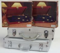 Four coin collector's cases including two flight style examples