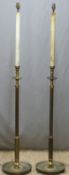 A pair of brass standard lamps