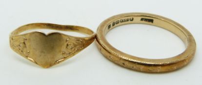 A 9ct gold ring and a 9ct gold signet ring, 2.8g