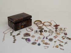 A collection of costume jewellery including rolled gold bangle, Victorian brooch, micro mosaic