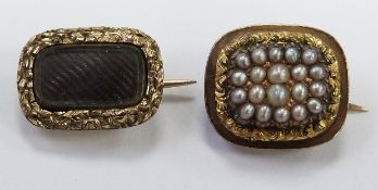 Victorian brooch set with seed pearls with a textured border and a Victorian mourning brooch set