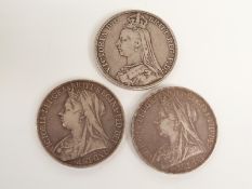 Three Victorian silver crowns comprising 1889 Jubilee head and two 1900 veiled head examples