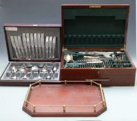 Two canteens of cutlery, one King's pattern the other stainless steel with beaded edge and a brass