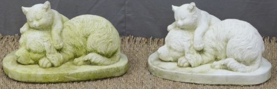 A pair of garden models of a dog and cat sleeping, length 33cm