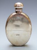 Hallmarked silver oval spirit flask with pull off cup and bayonet cap, London 1915, maker likely