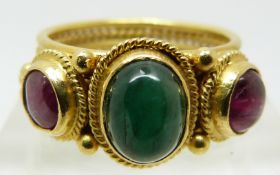 Ilias Lalaounis 18ct gold ring set with an emerald cabochon and two ruby cabochons, originally