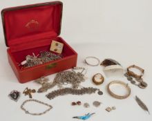 A 9ct gold crucifix, large quantity of silver chains, silver brooch set with enamel, etc