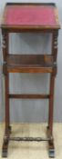 19thC mahogany lectern or desk with sloping writing surface below raised on scrolling supports