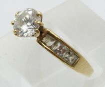 A 9ct gold ring set with cubic zirconia (size L)