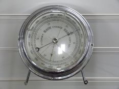Bulkhead aneroid barometer in chrome plated case by Short & Mason Ltd, London, diameter 15cm
