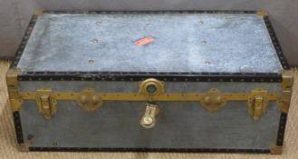 A metal bound and riveted flight case/trunk, H35 x W100 x D50cm