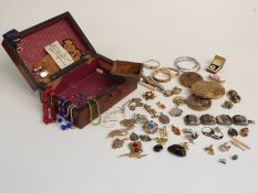 A collection of costume jewellery including compacts, bracelet, earrings, silver earrings, silver