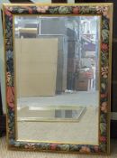 Bevelled edge mirror in floral printed surround, overall size 64x90cm