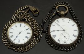 Two silver open faced pocket watches both with blued hands, Roman numerals and white enamel dials,