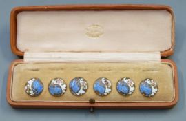 Cased set of early 20th century enamelled buttons, marked to interior of lid Fisher 188 Strand,