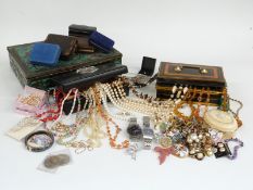 A collection of costume jewellery including beaded necklaces, earrings, brooches etc