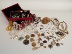 A collection of costume jewellery including necklaces, brooches, a filigree brooches etc