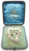 Scottish silver brooch with yellow metal mistletoe decoration by R & H. B. Kirkwood, 66 & 68 Thistle