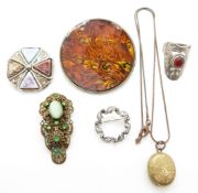 A silver brooch set with marcasite, a Victorian locket, brooches and a silver ring