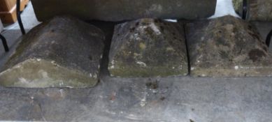 Two natural stone gate pillar tops, width 43cm together with a piece of wall capping