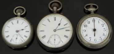 Three open faced pocket watches comprising a hallmarked silver keyless winding example with inset