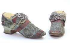 A pair of Georgian embroidered ladies shoes with cut steel buckles and leather soles