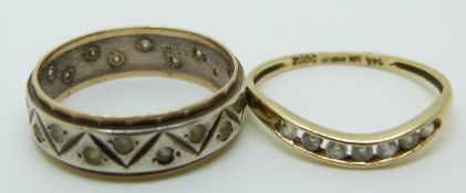 A 14ct gold ring set with cubic zirconia (size P) and a silver and 9ct gold eternity ring (size N)