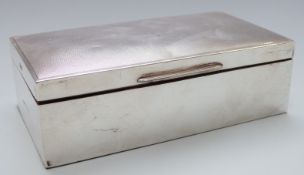 Elizabeth II hallmarked silver cigarette box with engine turned lid, London 1952 maker Harman