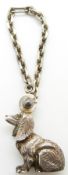 French white metal model of a dog with 800 grade silver mark, on a short possibly key chain