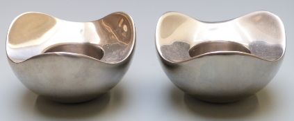 Pair of George Jensen candle or night light holders, diameter 9cm