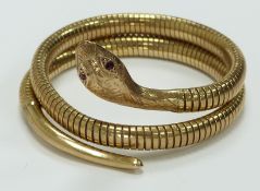 A 9ct gold snake bracelet set with ruby eyes, Birmingham 1978