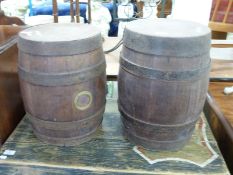Two coopered barrels formed into seats ot stools, height of larger 43cm