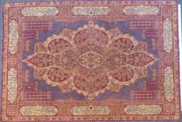 Persian fine wool/silk wall hanging with central floral design and Islamic script border, 185x127cm