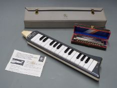 Hohner Melodica 'Piano 26' with original instructions etc and case, together with a Hohner Super