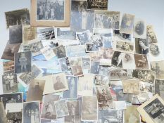 A quantity of Victorian and later photographs and postcards including Sherfield schoolchildren 1892,