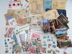 Postcards, cigarette cards and stamps including a South African block