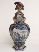 18th/19thC Delft polychrome baluster vase and cover with parrot finial, signed to base with three